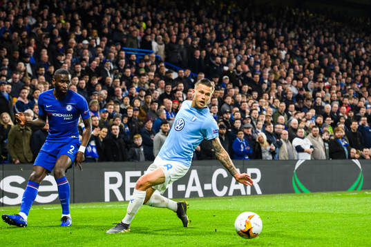 Antonio Rüdiger of Chelsea and Arnor Traustason of Malmö
