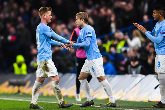 Anders Christiansen changes with Oscar Lewicki of Malmö FF