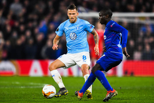 Arnor Traustason of Malmö FF and N'Golo Kante of Chelsea