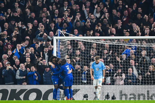 Olivier Giroud celebrates with Willian and N'Golo Kante of