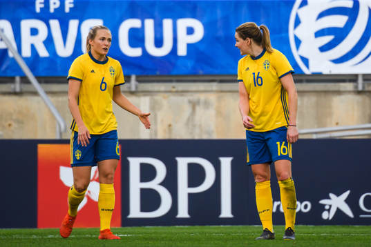 Magdalena Eriksson and Mia Carlsson of Sweden  looks