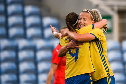 Hanna Glas and Kosovare Asllani of Sweden  celebrates
