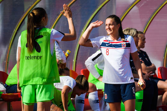 Ingrid Syrstad Engen of Norway celebrates with substitutes