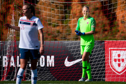 Stine Hovland and goalkeeper Ingrid Hjelmseth +of Norway