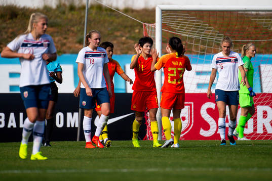 Wang Shanshan of China celebrates with her teammates