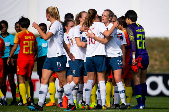 Caroline Graham Hansen hugs Stine Hovland of Norway