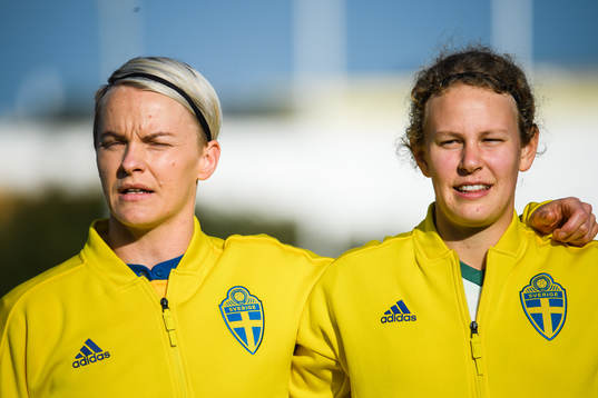 Nilla Fischer and goalkeeper Cajsa Andersson of Sweden