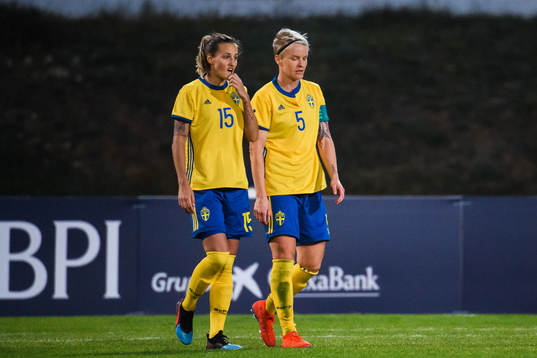 Nathalie Björn and Nilla Fischer of Sweden looks dejected