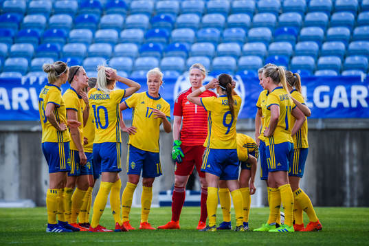 Caroline Seger and goalkeeper Hedvig Lindahl of Sweden