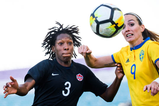 Kadeisha Buchanan of Canada and Kosovare Asllani of Sweden