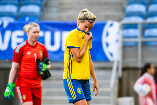 Goalkeeper Hedvig Lindahl and Jonna Andersson of Sweden