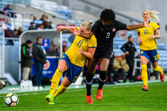 Kadeisha Buchanan of Canada and Stina Blackstenius of Sweden