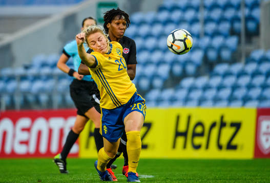 Mimmi Larsson of Sweden and Kadeisha Buchanan of Canada