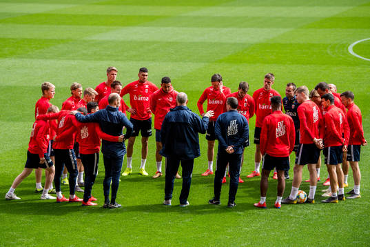 Lars Lagerbäck, head coach of Norway, gathers his players