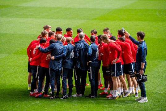 Lars Lagerbäck, head coach of Norway, gathers his players