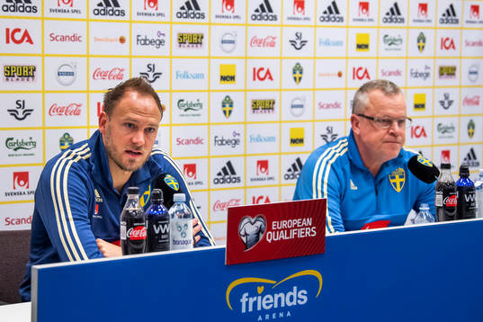 Sweden's head coach Janne Andersson (R) and team captain