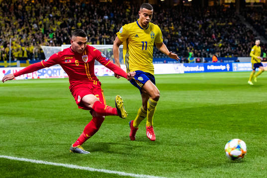 Cristian Manea of Romania and Robin Quaison of Sweden