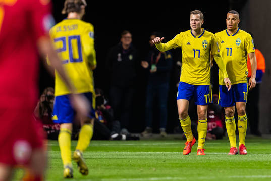 Viktor Claesson and Robin Quaison of Sweden celebrates