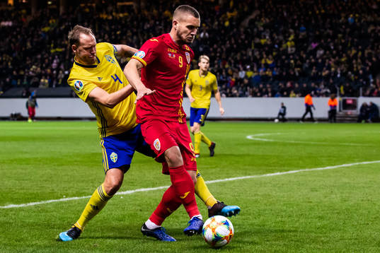 Andreas Granqvist of Sweden and George Puscas of Romania