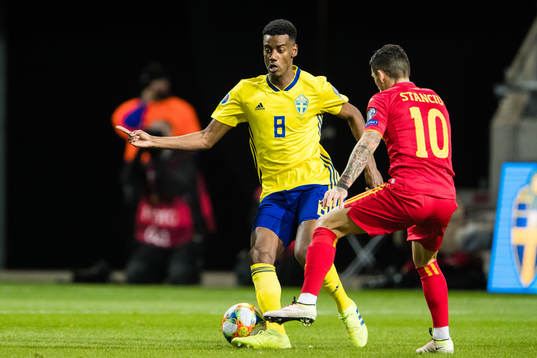 Alexander Isak of Sweden and Nicolae Stanciu of Romania