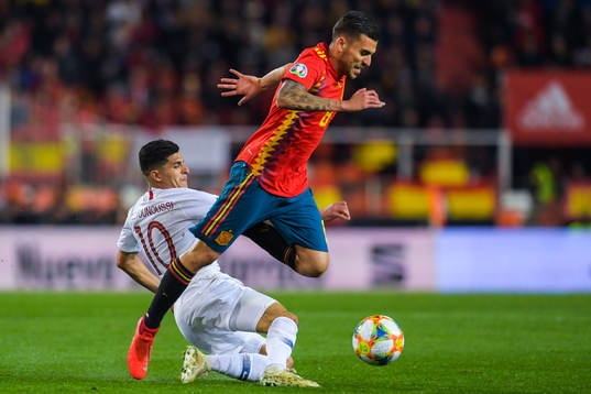 Tarik Elyounoussi of Norway and Dani Ceballos Fernandez of