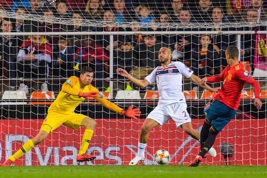 Rodrigo Moreno Machado of Spain scores 1-0 behind