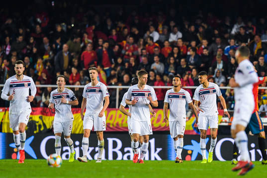 Joshua King of Norway celebrates with teammates