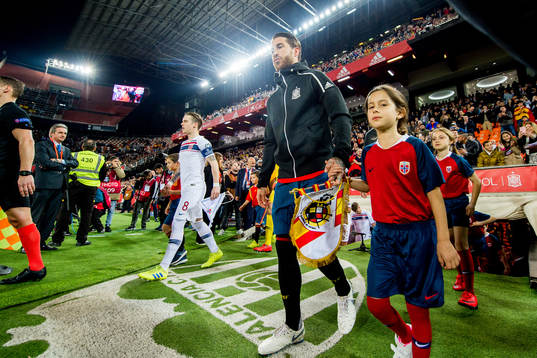 Stefan Johansen of Norway and Sergio Ramos of Spain
