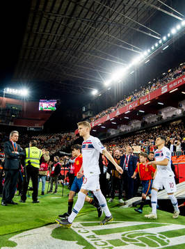 Martin Ødegaard and Tarik Elyounoussi of Norway