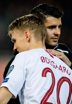 Martin Ødegaard of Norway and Alvaro Morata of Spain