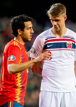 Daniel Parejo Munoz of Spain and Kristoffer Ajer of Norway