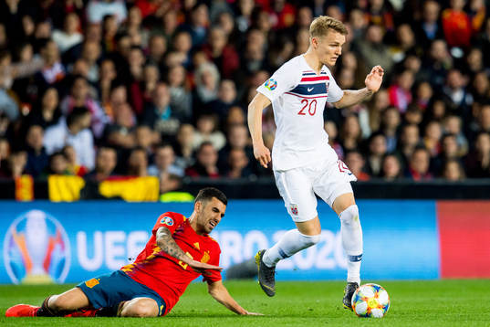 Dani Ceballos Fernandez of Spain and Martin Ødegaard of