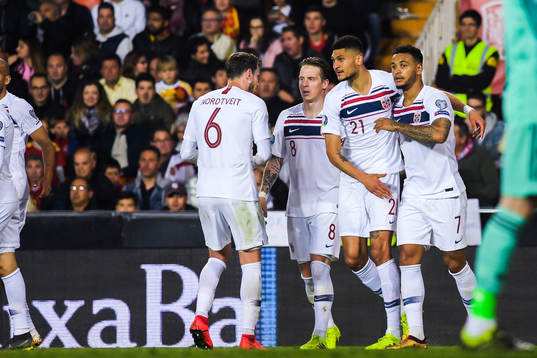 Joshua King of Norway celebrates with teammates