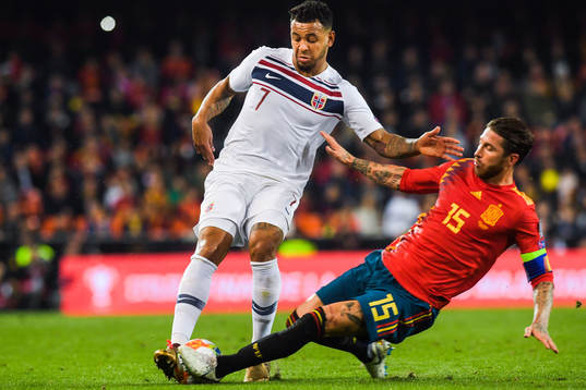 Joshua King of Norway and Sergio Ramos of Spain