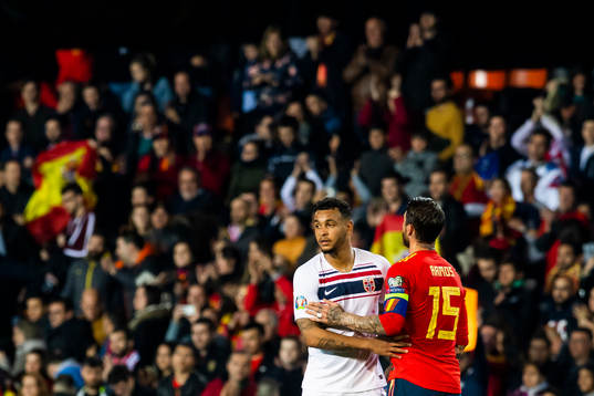 Joshua King of Norway and Sergio Ramos of Spain