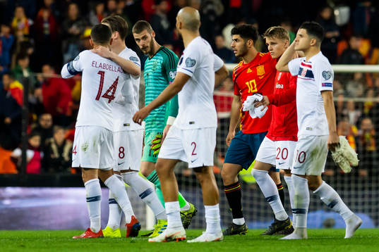 Goalkeeper David de Gea, Marco Asensio of Spain and Martin