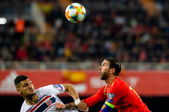 Bjørn Maars Johnsen of Norway and Sergio Ramos of Spain