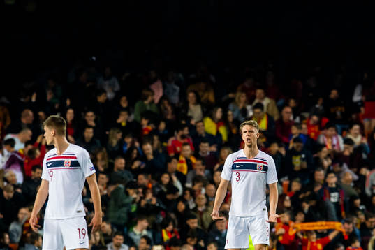 Kristoffer Ajer of Norway looks dejected
