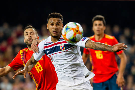 Joshua King of Norway and Jordi Alba of Spain
