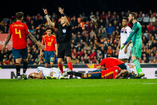 Bjørn Maars Johnsen of Norway and Sergio Ramos of Spain