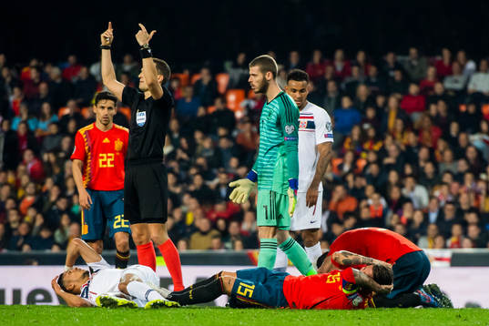 Bjørn Maars Johnsen of Norway and Sergio Ramos of Spain