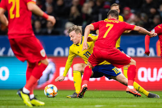 Emil Forsberg of Sweden and Alexandru Chipciu of Romania