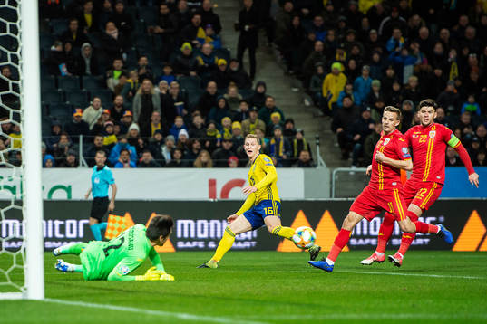 Emil Krafth of Sweden against goalkeeper Ciprian