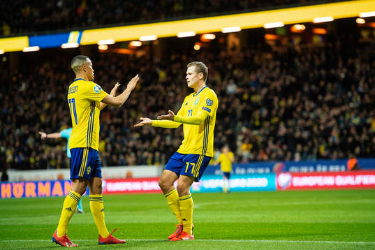 Robin Quaison and Viktor Claesson of Sweden  celebrates
