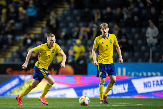 Sebastian Larsson and Filip Helander of Sweden