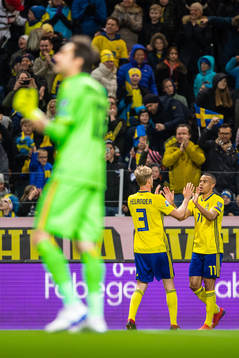 Filip Helander and Robin Quaison celebrate