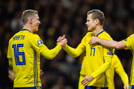 Emil Krafth and Viktor Claesson of Sweden celebrate