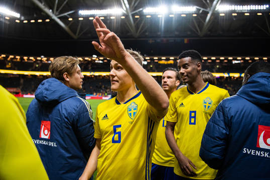 Ludwig Augustinsson and Alexander Isak of Sweden celebrate