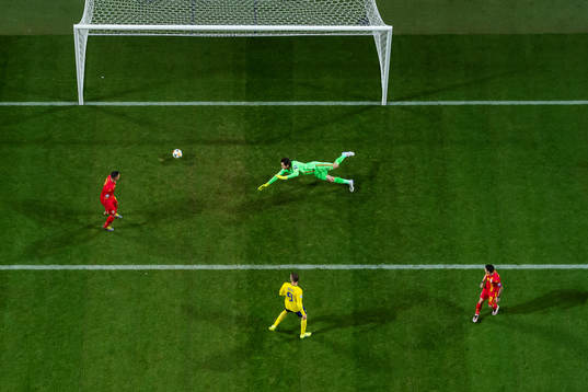 Viktor Claesson of Sweden (not pictured) scores 2-0 behind