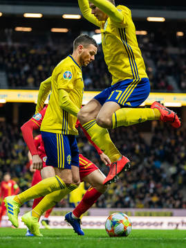 Marcus Berg and Viktor Claesson of Sweden